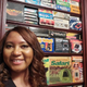 Image of Linda Guillory in front of her Guinness World Record video game collection.